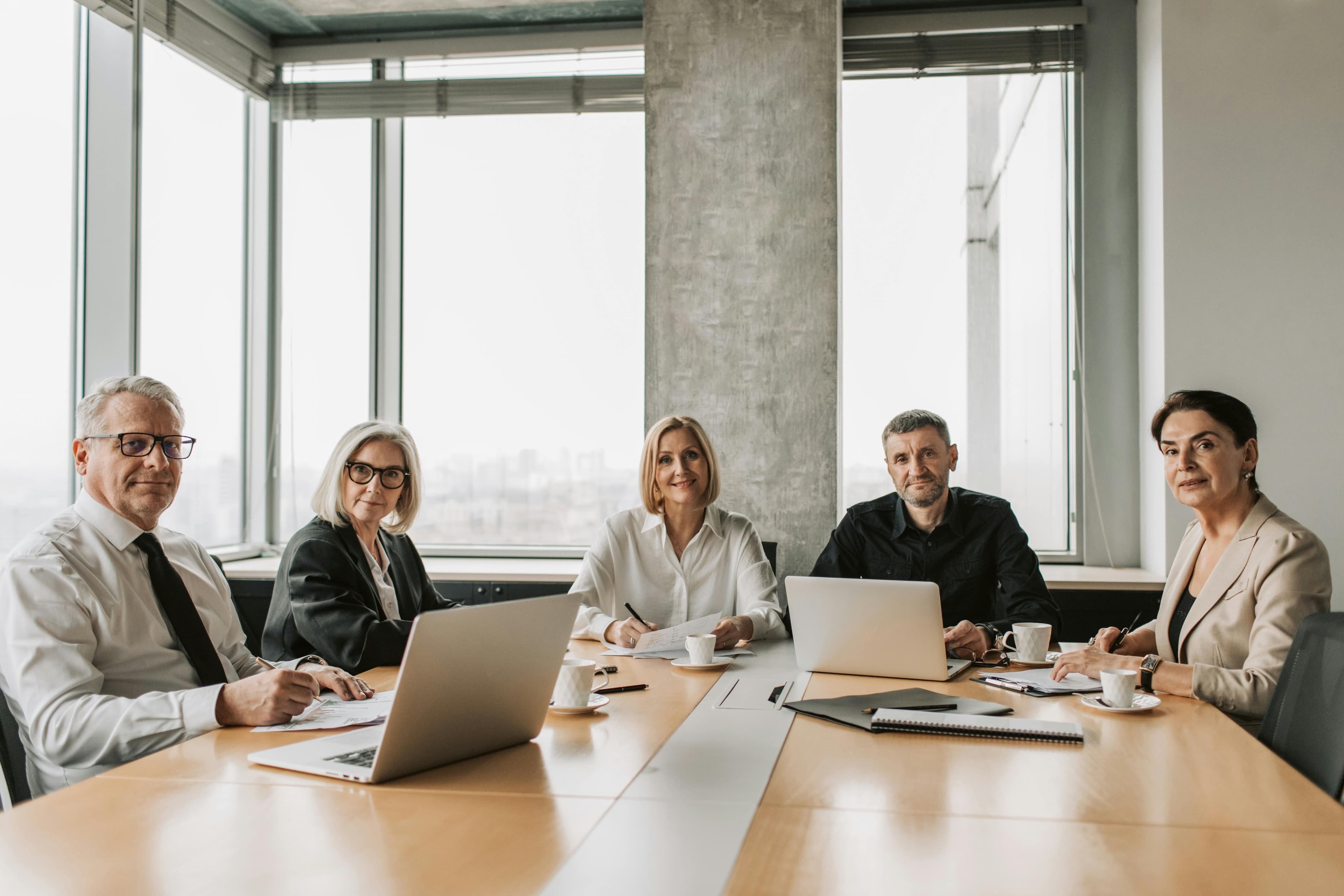 Board meeting discussing technology risk assessment