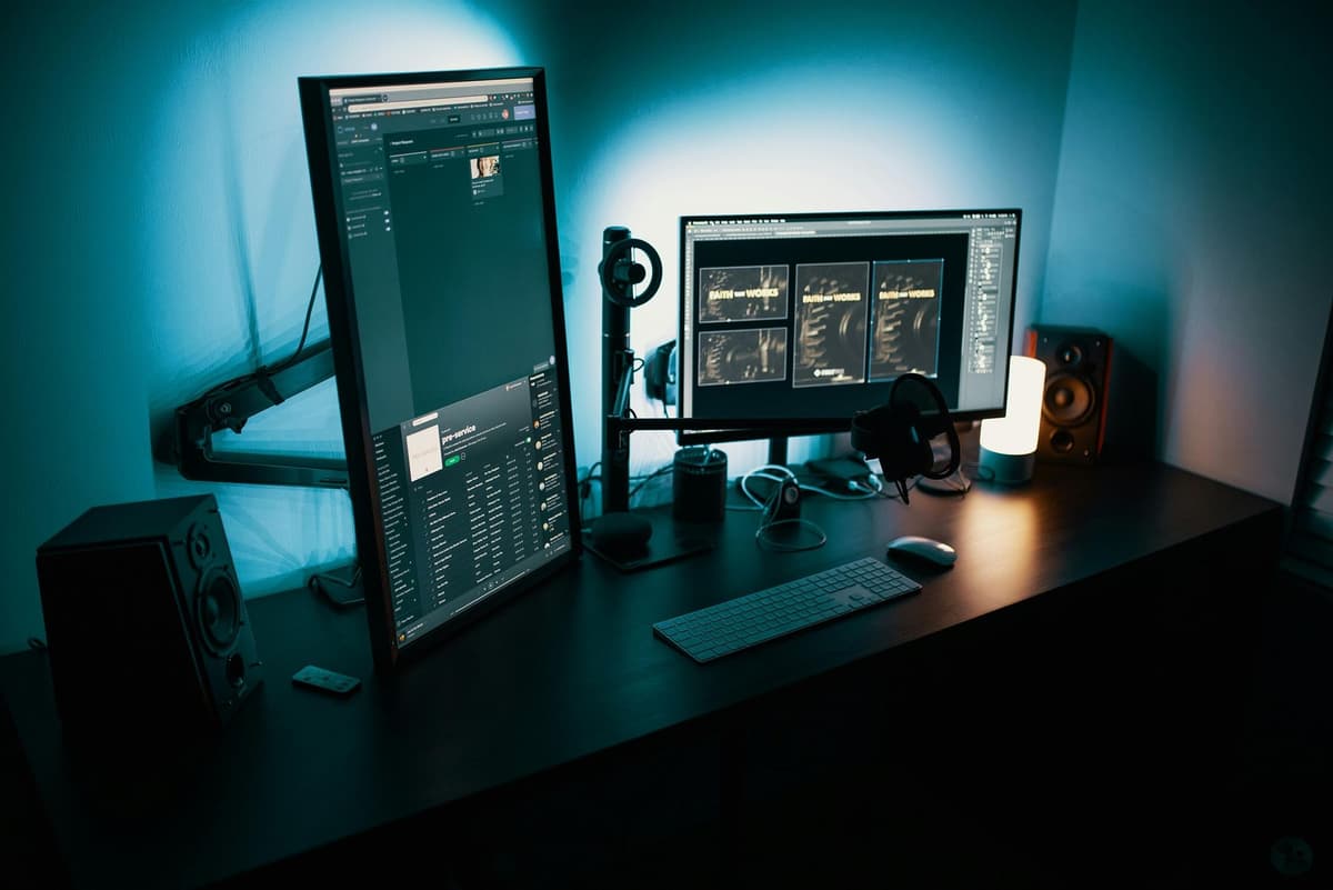 Multi-screen technology setup representing virtual and fractional CTO leadership